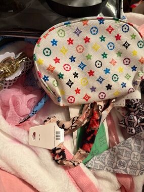 Multicolor Patterned Cosmetic Pouch - White filled to the brim